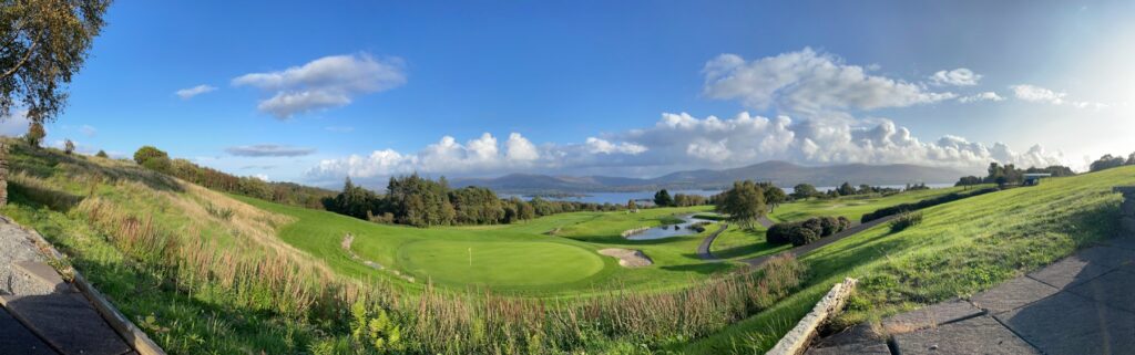 Panoramic view of a Killarney golf course with lakes and mountains in County Kerry